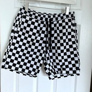 Vans, Men's size small, checkerboard, white and black shorts Small